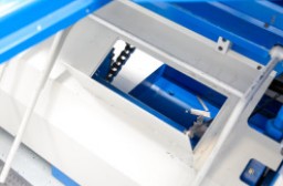 Kleinteilklappe für Auswurf nach vorne